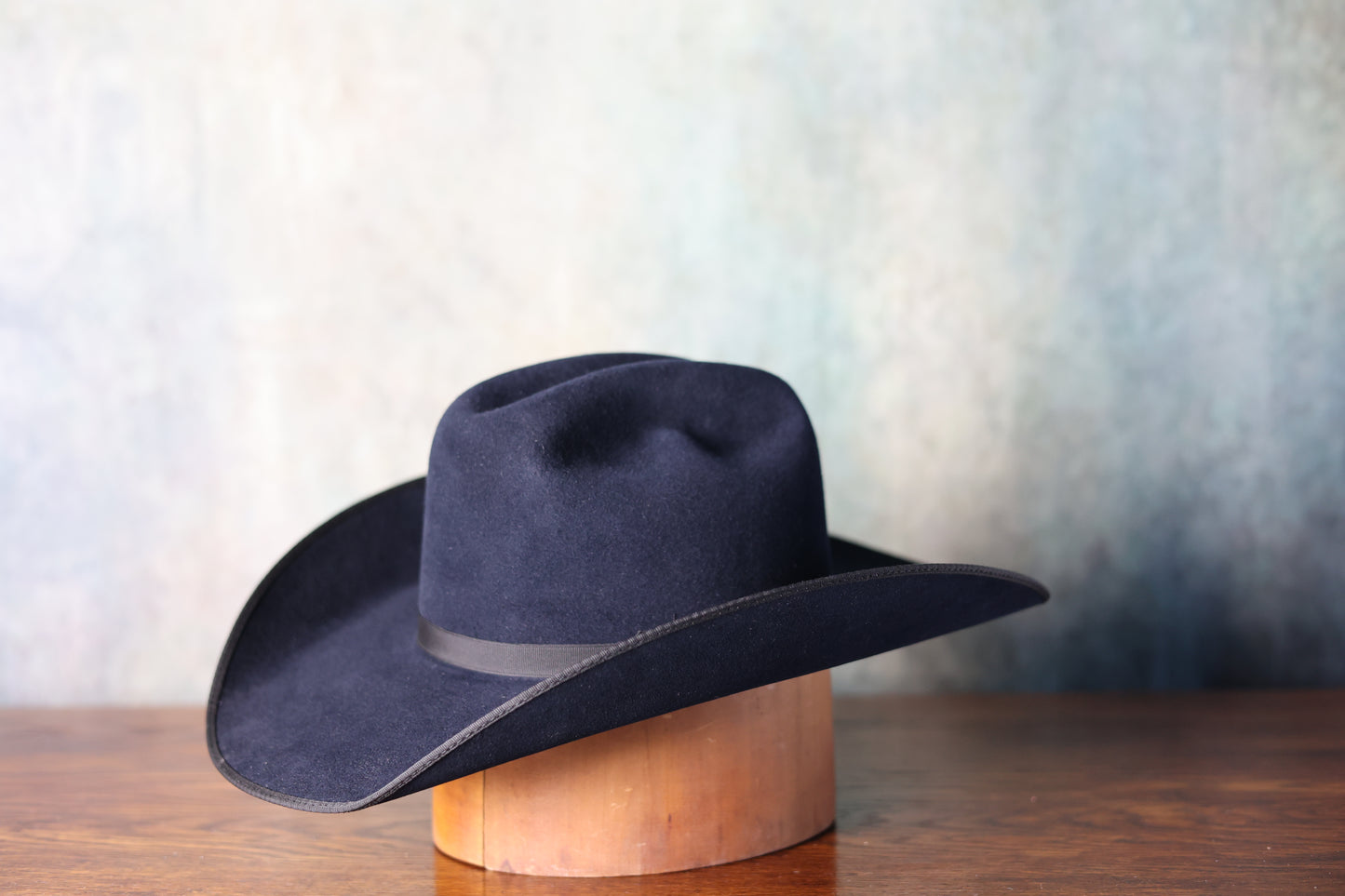 Side-facing photo of the Friday the 13th “The River Rat” Limited Edition Cowboy Hat from Greeley Hat Works with Bayou Blue felt and black band