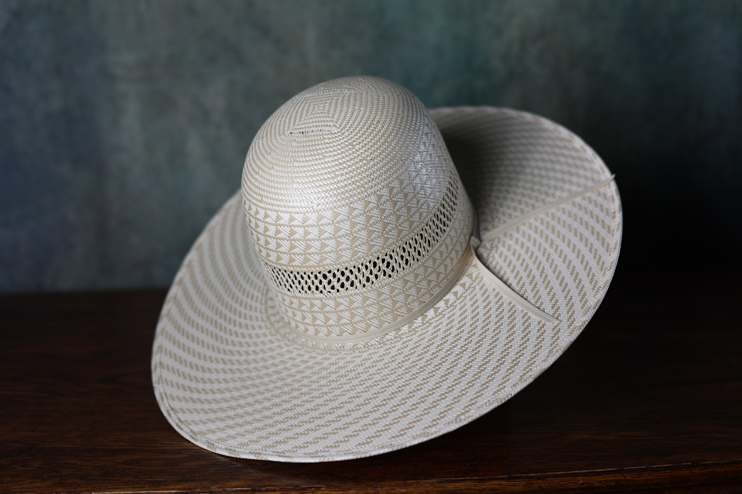 Photo of the Atwood Lubbock Open/Flat straw hat from Greeley Hat Works tilted to show design