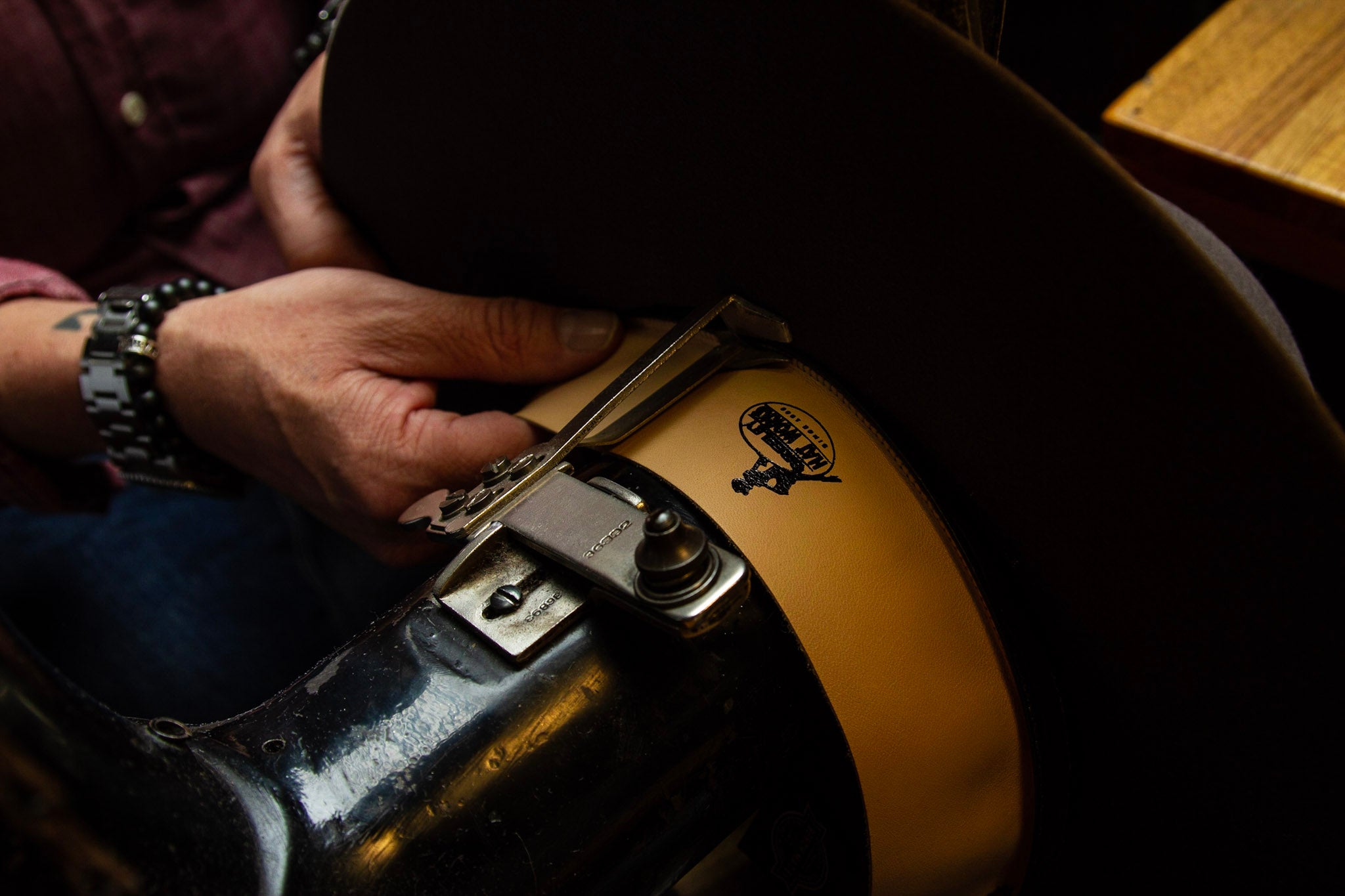 Photo of hatmaker at Greeley Hat Works in Greeley, Colorado putting together a custom cowboy hat