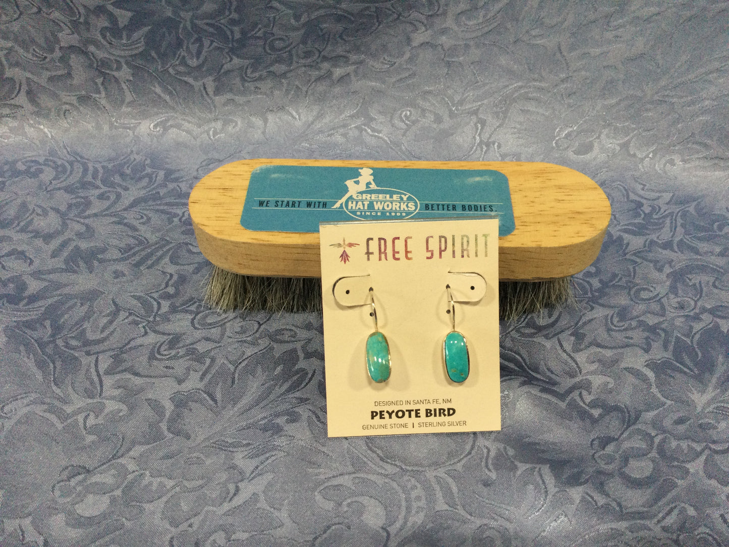 Photo of the Turquoise Oval Dangle Earrings from Free Spirit by Peyote Bird Earrings sold by Greeley Hat Works
