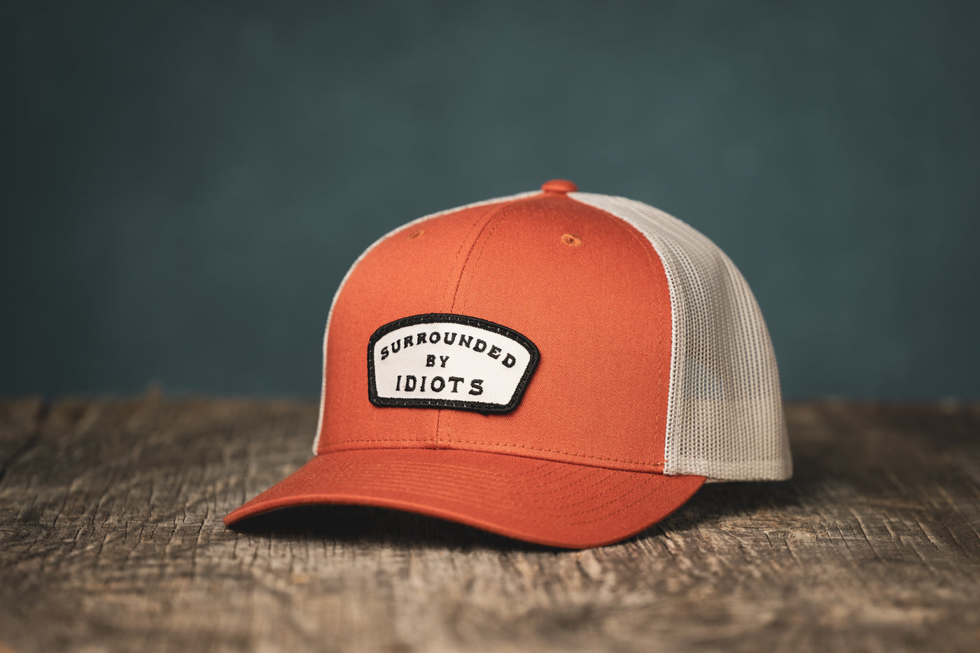 Surrounded By Idiots Cap