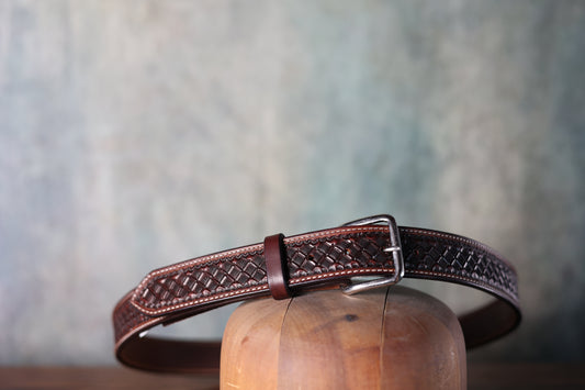 Photo of the Texas Saddlery Hand Tooled Leather Chocolate Waffle Stampede Belt with a silver buckle