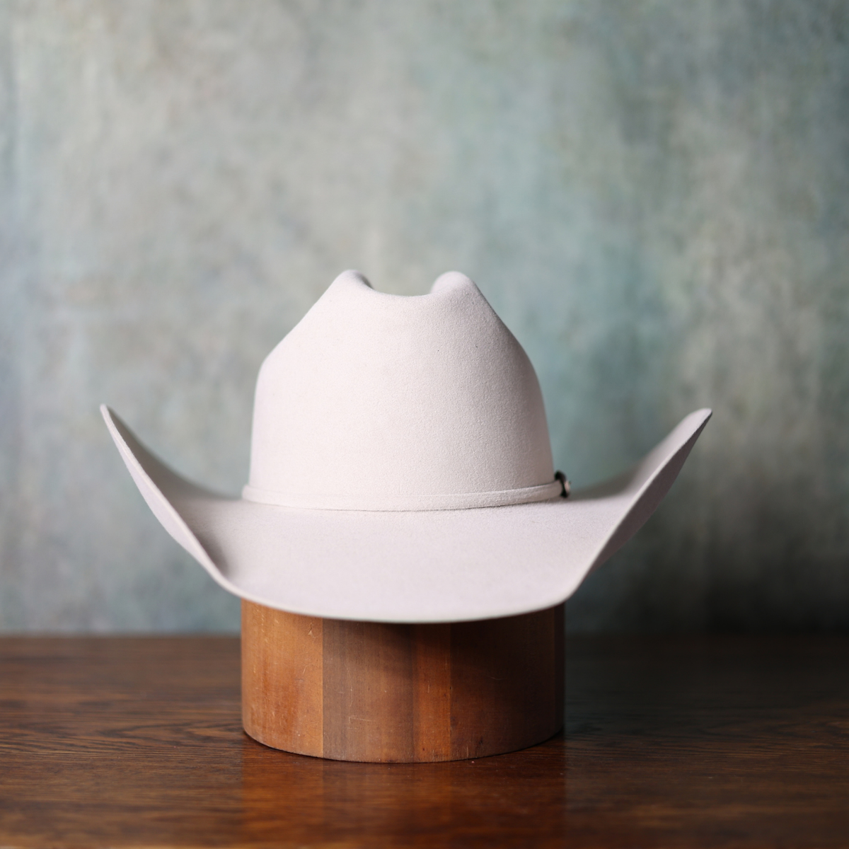 Defined Cattleman + Cattleman  — straight on view