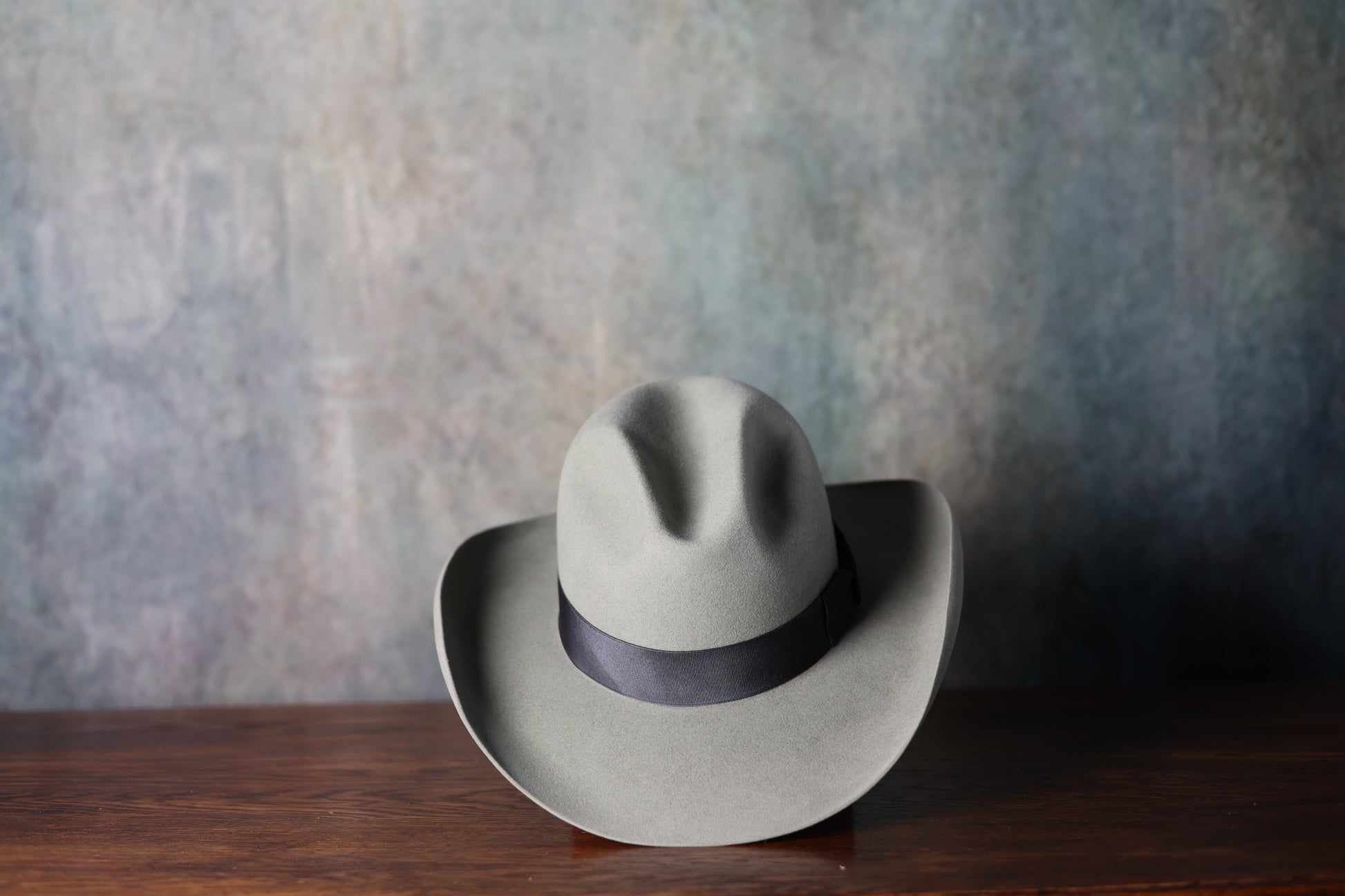 Photo of the top of the NINE70 Owens Fashion Hat from Greeley Hat Works with thick grey band, aqua color and unisex style