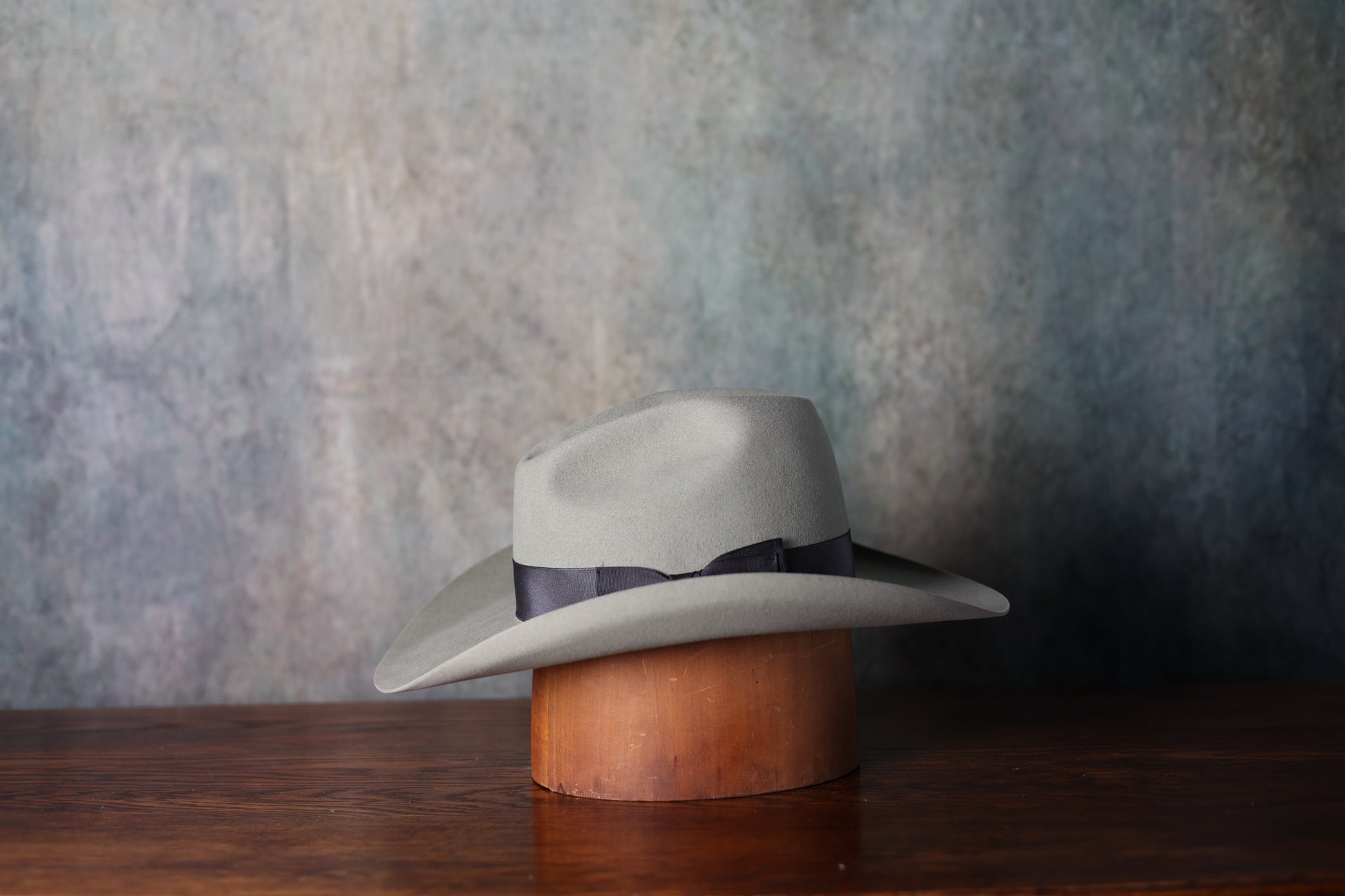 Photo of the side of the NINE70 Owens Fashion Hat from Greeley Hat Works with thick grey band and unisex style
