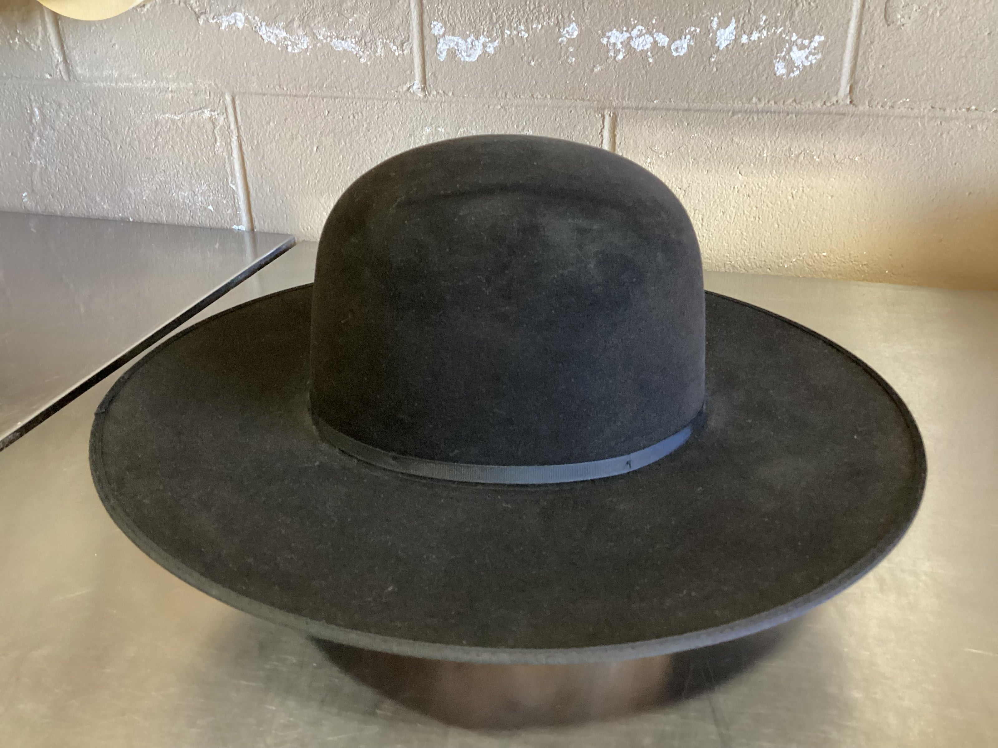Photo of black felt western hat after ReCraft services from Greeley Hat Works